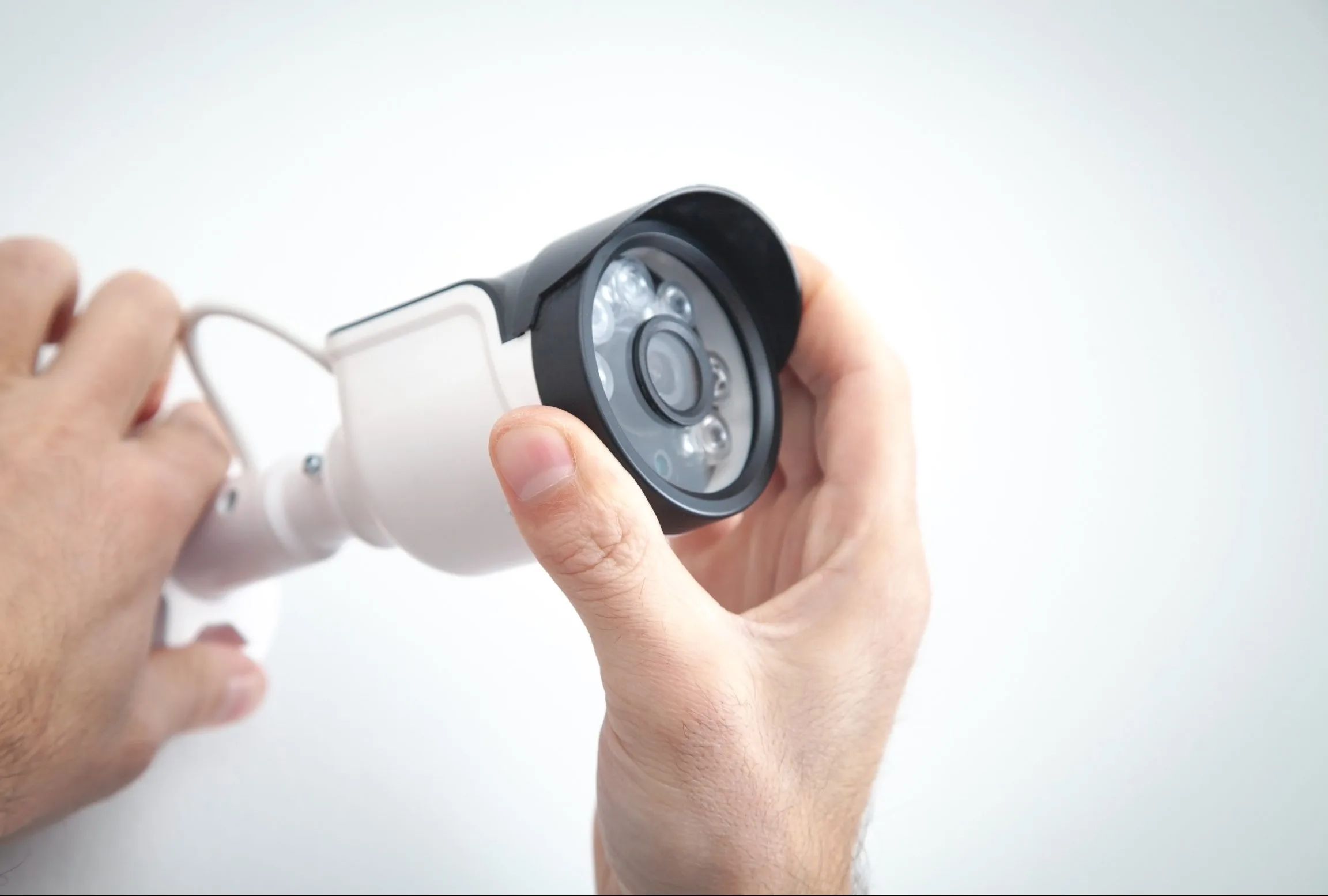 Alarmas Aaa - Alarmas Aaa - Web Design - alarmas aaa - technician installing cctv camera system for home scaled e1669130358273 - branding