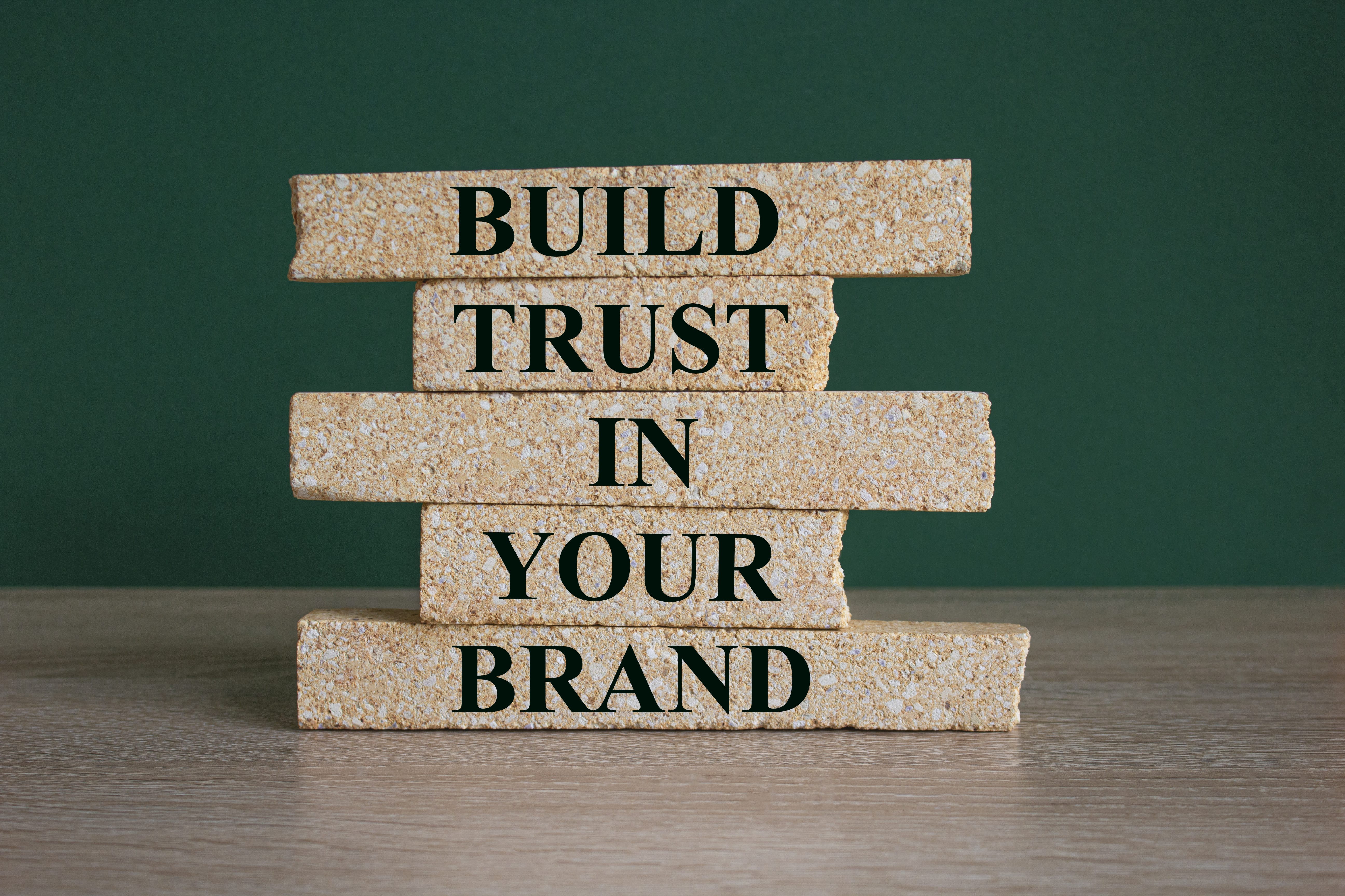 - successful brand - success business process symbol brick blocks stacking as step stair green background copy space words build trust your brand business trust brand concept - branding